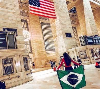 Participant with Brazilian flag in Grand Central Station